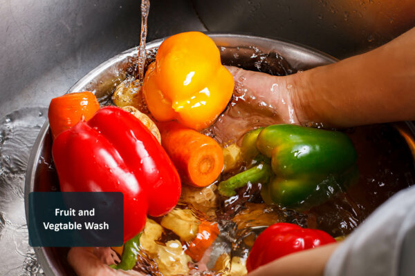 hands wash vegetables in basin peroxide