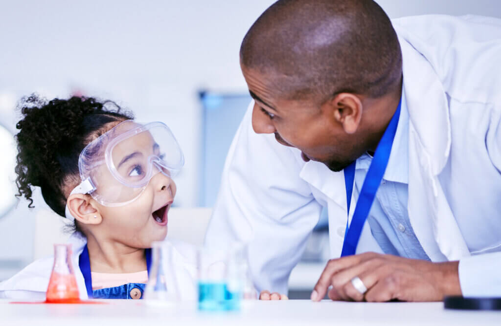 Chemistry, excited and father with child in laboratory for medical research, science and education