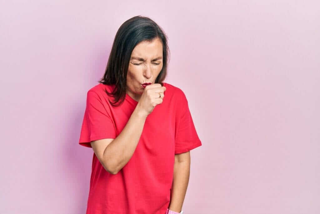 Woman coughing