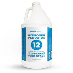 A white one-gallon jug of 12% food grade hydrogen peroxide on a white background.